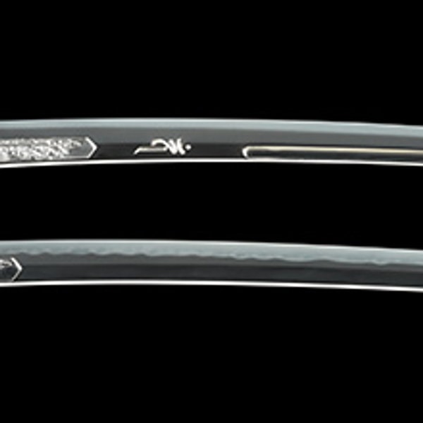 by Kasama Ikkansai Shigetsugu - Daisho: Kasama Ikkansai Shigetsugu with carving, Showa 10 (katana) and Showa 12 (wakizashi)
