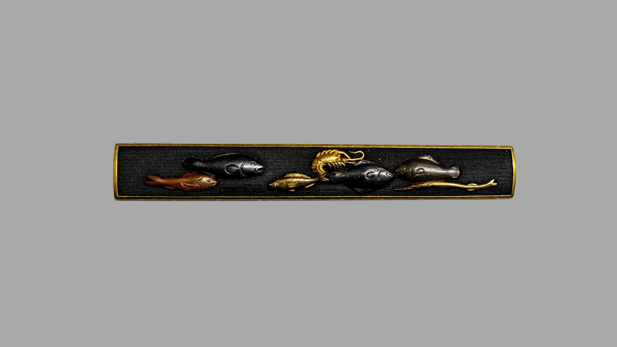 Fuchi-Kashira - Tokuho - by Goto Enjo - Fuchi-Kashira: Goto Mitsutaka (kao) - Fish in a Variety of Forms Motif