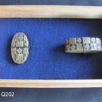 Fuchi-Kashira - Shakudo and Brass Fuchi Kashira: Manji