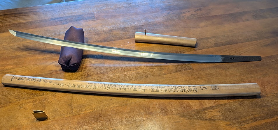 Higo Enju Saemon-no-Jō Kunitsuna tachi published in the Kozan Oshigata