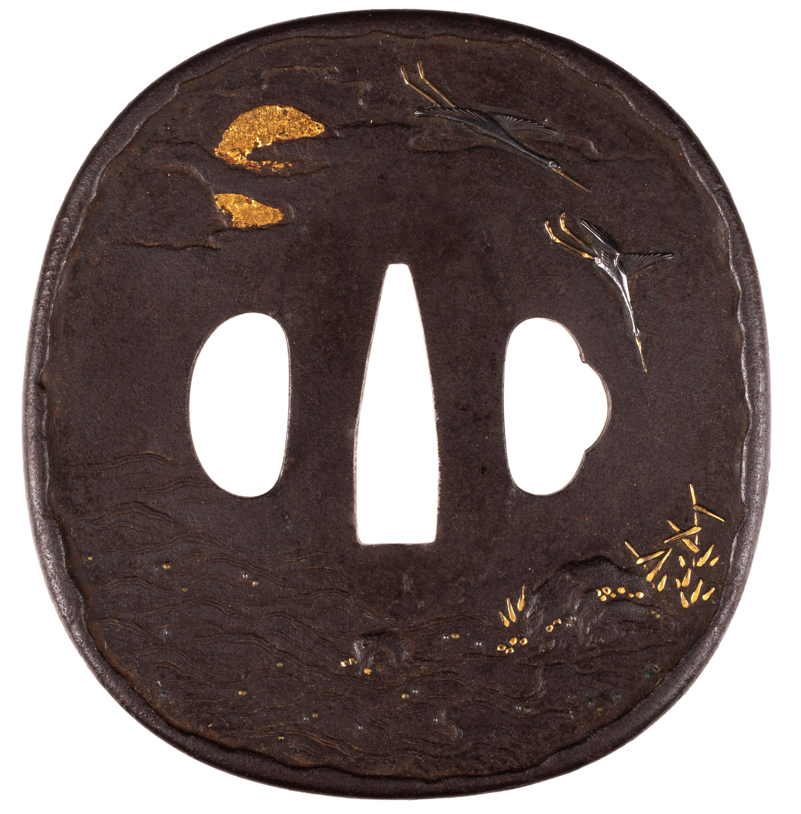 Iron tsuba decorated with wild geese at sunset