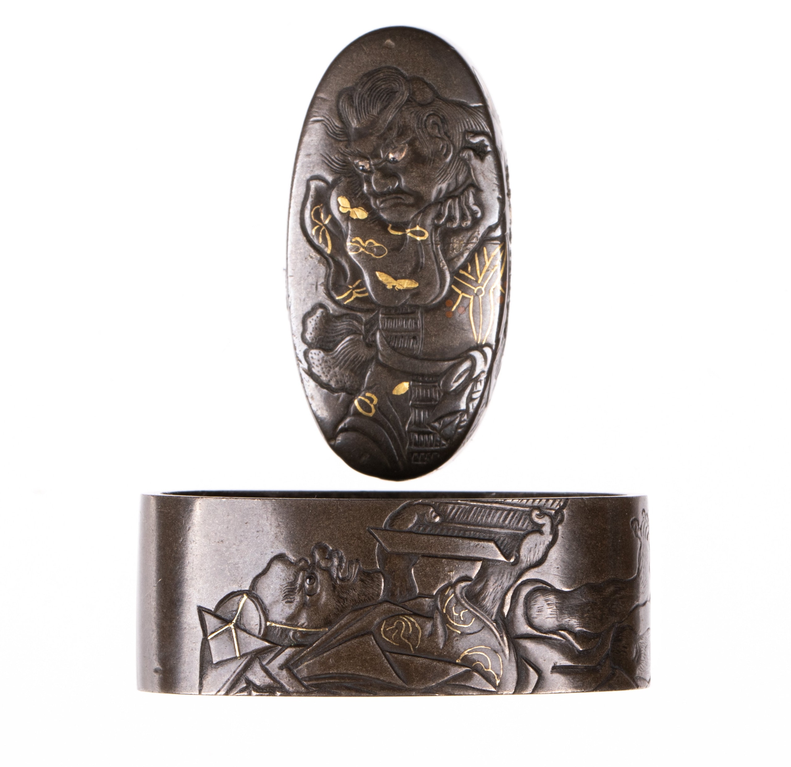 Fuchi-Kashira - by Nara School - Shibuichi Fuchikashira decorated with Kusazuri Biki episode from Soga Monogatari