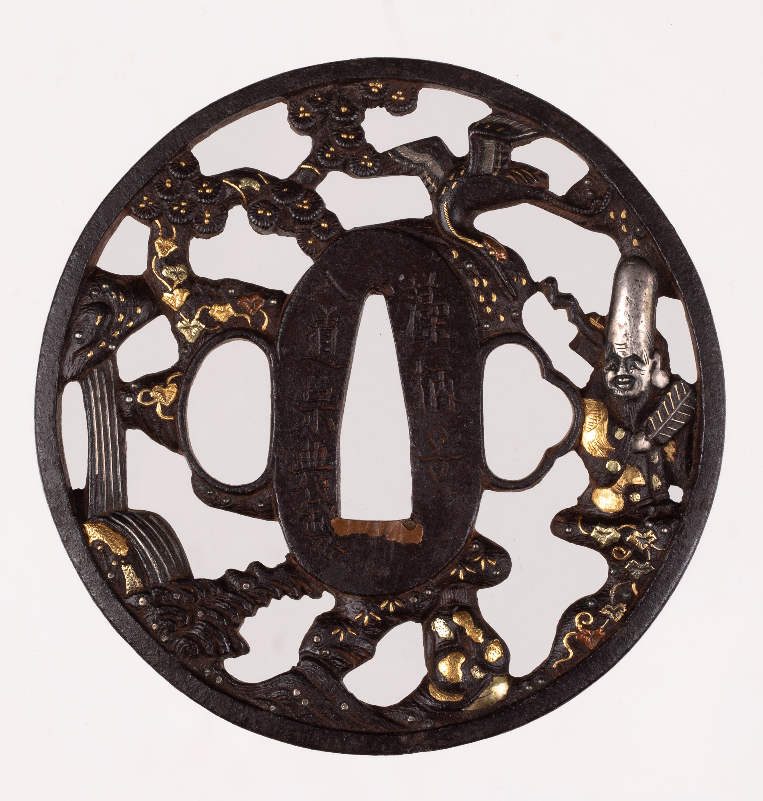 Iron Soten style tsuba signed "Goshu Hikone Ju Mogarashi Nyudo Soten Sei"