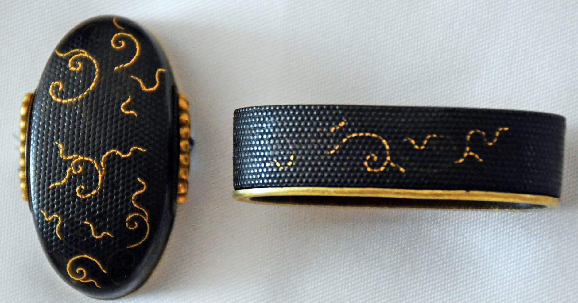 Fuchi-Kashira - Hozon - by Umetada School - Fuchi-Kashira with Arabesque Design, Mumei (Umetada), NBTHK Hozon Certificate